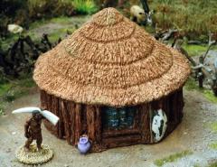 Timber/wattle hut with conical pattern thatch roof