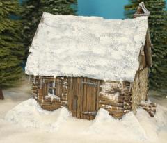 Snow Covered Slotted Timber/Daub Cabin, normal roof